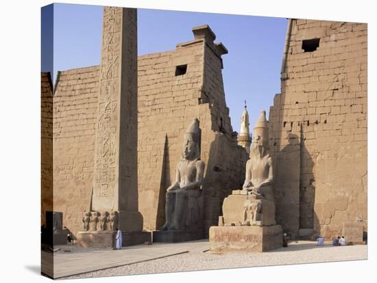 Colossi of Rameses II, Luxor Temple, Luxor, Unesco World Heritage Site, Thebes, Egypt-Peter Scholey-Stretched Canvas