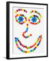 Coloured Chocolate Beans Forming a Smiling Face-Greg Elms-Framed Photographic Print