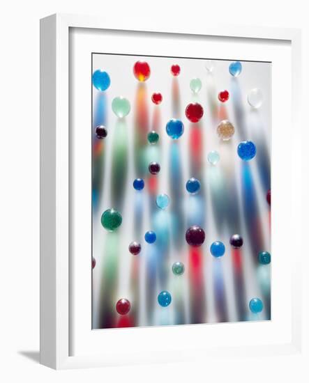 Coloured Marbles Creating Interesting Coloured Long Shadows-Frankie Angel-Framed Photographic Print