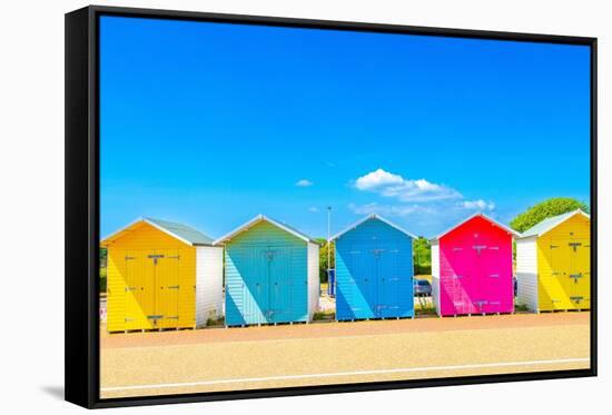 Colourful Beach Huts on the seafront at Eastbourne, East Sussex, England, United Kingdom, Europe-Barry Davis-Framed Stretched Canvas