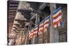 Colourful Buddhist Flags Adorning Columns-Charlie-Stretched Canvas