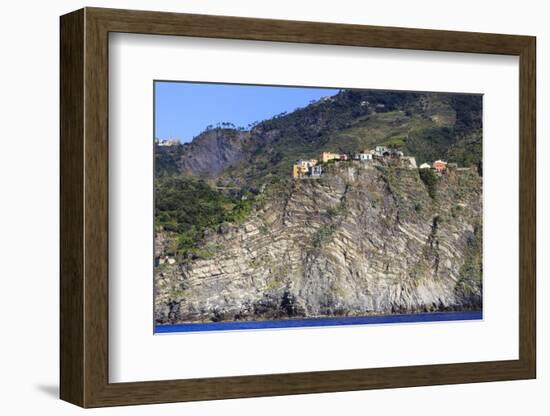 Colourful houses and cliffs atop rocky promontory, Corniglia, Cinque Terre, UNESCO World Heritage S-Eleanor Scriven-Framed Photographic Print