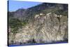 Colourful houses and cliffs atop rocky promontory, Corniglia, Cinque Terre, UNESCO World Heritage S-Eleanor Scriven-Stretched Canvas