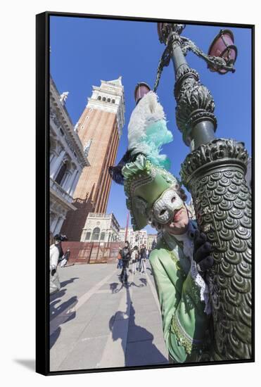 Colourful mask and costume of the Carnival of Venice, famous festival worldwide, Venice, Veneto, It-Roberto Moiola-Framed Stretched Canvas