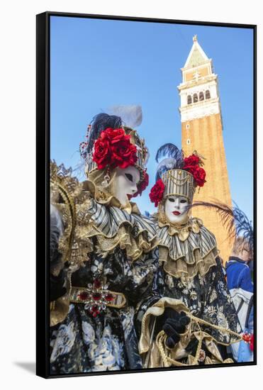 Colourful masks and costumes of the Carnival of Venice, famous festival worldwide, Venice, Veneto, -Roberto Moiola-Framed Stretched Canvas