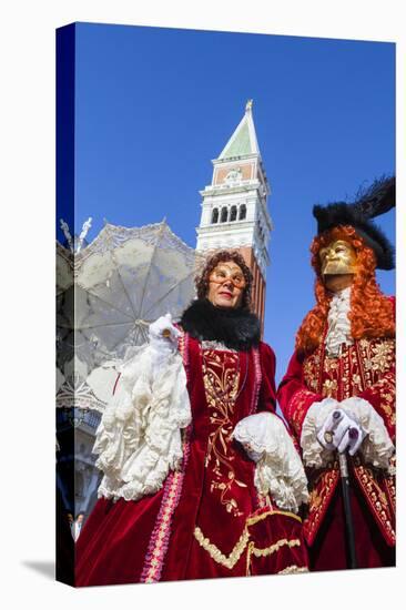 Colourful masks and costumes of the Carnival of Venice, famous festival worldwide, Venice, Veneto, -Roberto Moiola-Stretched Canvas