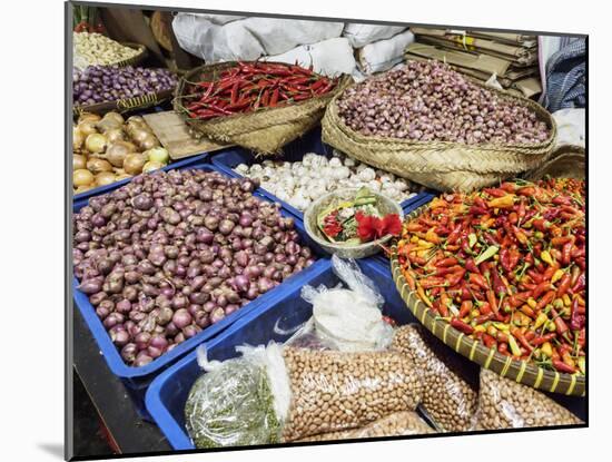 Colourful produce of peppers, garlic, onions, peanuts and shallots, at a market in Denpasar, Bali,-Melissa Kuhnell-Mounted Photographic Print