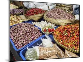 Colourful produce of peppers, garlic, onions, peanuts and shallots, at a market in Denpasar, Bali,-Melissa Kuhnell-Mounted Photographic Print