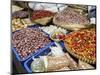 Colourful produce of peppers, garlic, onions, peanuts and shallots, at a market in Denpasar, Bali,-Melissa Kuhnell-Mounted Photographic Print