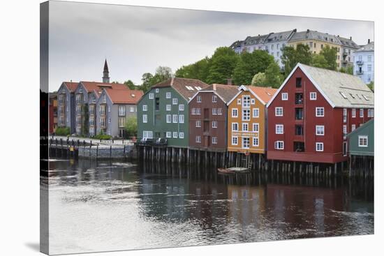 Colourful Wooden Warehouses on Wharf Beside the Nidelva River-Eleanor Scriven-Stretched Canvas