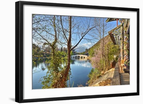 Colourful Yunnan Wood Carvings with Suocui Bridge and Moon Embracing Pavilion, Lijiang, Yunnan-Andreas Brandl-Framed Photographic Print