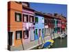 Colourfully Painted Houses Situated on Canal Banks on the Island of Burano, Located Near Venice, Ve-Kimberley Coole-Stretched Canvas