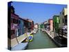 Colourfully Painted Houses Situated on Canal Banks on the Island of Burano, Located Near Venice, Ve-Kimberley Coole-Stretched Canvas