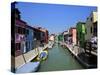 Colourfully Painted Houses Situated on Canal Banks on the Island of Burano, Located Near Venice, Ve-Kimberley Coole-Stretched Canvas