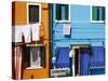 Colourfully Painted Houses Situated on Canal Banks on the Island of Burano, Located Near Venice, Ve-Kimberley Coole-Stretched Canvas