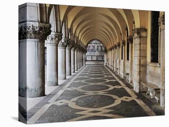 Columns and Archways Along Patterned Passageway at the Doge's Palace, Venice, Italy-Dennis Flaherty-Stretched Canvas