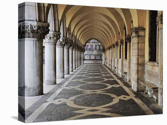 Columns and Archways Along Patterned Passageway at the Doge's Palace, Venice, Italy-Dennis Flaherty-Stretched Canvas