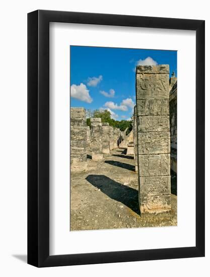 Columns with carved stonework on the Temple of the Warriors at the ancient Mayan city of Chichen...-null-Framed Photographic Print