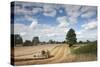 Combine Harvester Harvesting Oats (Avena Sativa), Haregill Lodge Farm, Ellingstring,Yorkshire, UK-Paul Harris-Stretched Canvas