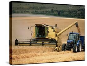 Combine Harvester Off-loading Grain-Jeremy Walker-Stretched Canvas