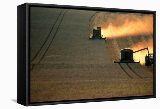 Combine Harvesters And Tractor Working In a Field-Jeremy Walker-Framed Stretched Canvas