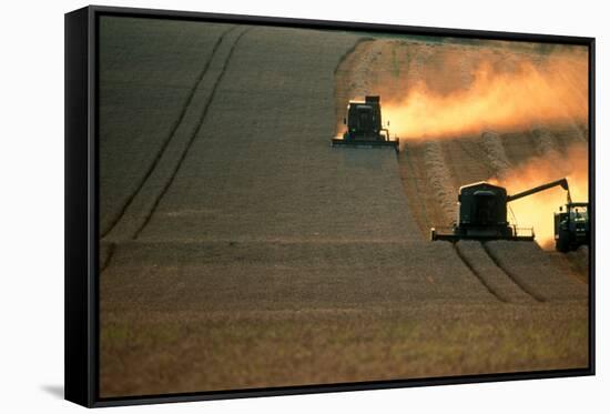 Combine Harvesters And Tractor Working In a Field-Jeremy Walker-Framed Stretched Canvas