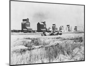 Combine Harvesters at Work in Canada-null-Mounted Photographic Print