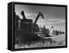 Combines Being Used to Harvest Wheat-Ed Clark-Framed Stretched Canvas