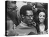 Comedian Bill Cosby Scanning Family Scrapbook with His Wife Camille and Mother-Charles H^ Phillips-Stretched Canvas