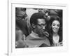 Comedian Bill Cosby Scanning Family Scrapbook with His Wife Camille and Mother-Charles H^ Phillips-Framed Premium Photographic Print