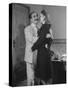 Comedian Groucho Marx Embracing a Woman-null-Stretched Canvas