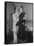 Comedian Groucho Marx Embracing a Woman-null-Framed Stretched Canvas