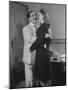 Comedian Groucho Marx Embracing a Woman-null-Mounted Photographic Print