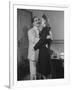 Comedian Groucho Marx Embracing a Woman-null-Framed Photographic Print