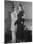 Comedian Groucho Marx Embracing a Woman-null-Mounted Photographic Print