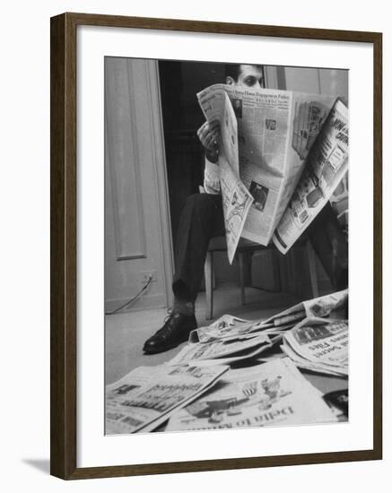 Comedian Mort Sahl at Home Reading Newspaper-Grey Villet-Framed Premium Photographic Print