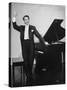 Comedian Pianist Victor Borge, in White Tie and Tails, Standing at Piano and Making Funny Faces-Peter Stackpole-Stretched Canvas