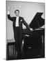 Comedian Pianist Victor Borge, in White Tie and Tails, Standing at Piano and Making Funny Faces-Peter Stackpole-Mounted Premium Photographic Print