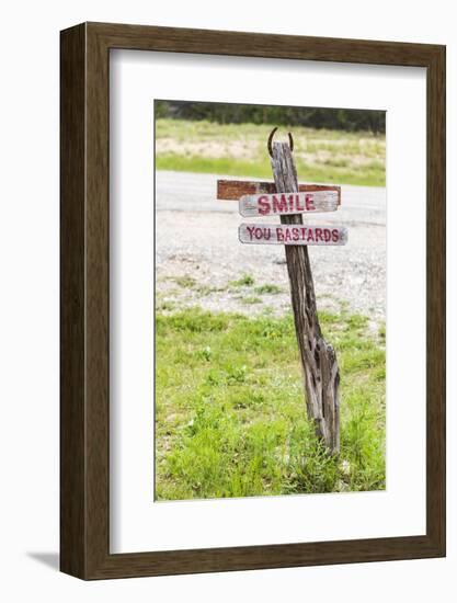 Comfort, Texas, USA. Humorous sign in the Texas Hill Country.-Emily Wilson-Framed Photographic Print