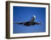 Commercial Airplane in Flight-Mitch Diamond-Framed Photographic Print