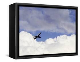 Commercial Airplane Soaring Above the Clouds-Mitch Diamond-Framed Stretched Canvas