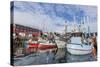 Commercial Fishing and Whaling Boats Line the Busy Inner Harbor in the Town of Ilulissat-Michael-Stretched Canvas