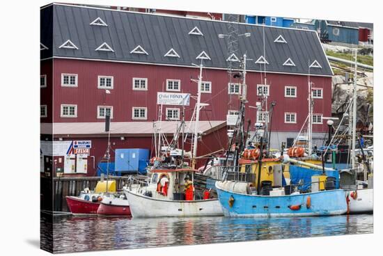 Commercial Fishing and Whaling Boats Line the Busy Inner Harbour in the Town of Ilulissat-Michael Nolan-Stretched Canvas