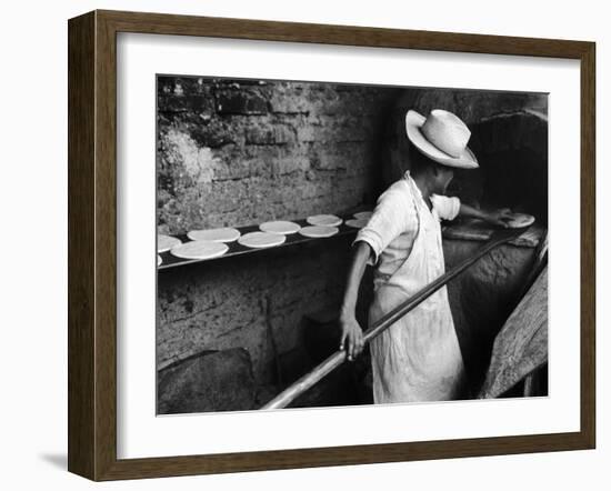 Communal Bakery in Primitive Mexican Village, Loaves of Bread Being Shoved into Adobe Oven-null-Framed Photographic Print