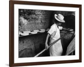 Communal Bakery in Primitive Mexican Village, Loaves of Bread Being Shoved into Adobe Oven-null-Framed Photographic Print