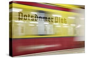 Commuter Train Speeding through Potsdamer Platz U-Bahn Station-Jon Hicks-Stretched Canvas