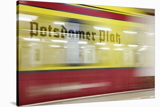 Commuter Train Speeding through Potsdamer Platz U-Bahn Station-Jon Hicks-Stretched Canvas