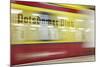 Commuter Train Speeding through Potsdamer Platz U-Bahn Station-Jon Hicks-Mounted Photographic Print