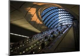 Commuters at Canary Wharf Underground Station Taken as the Sun Was Setting-John Woodworth-Mounted Photographic Print