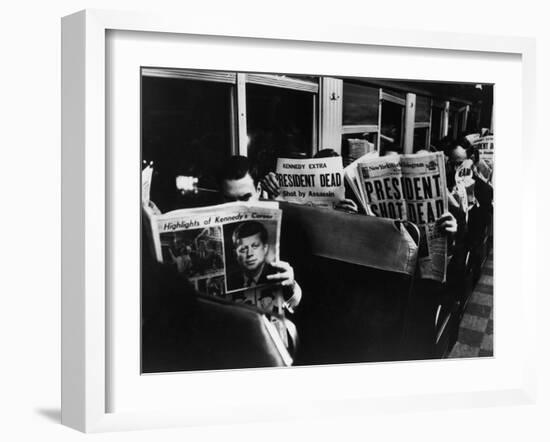 Commuters Reading of John F. Kennedy's Assassination-Carl Mydans-Framed Photographic Print